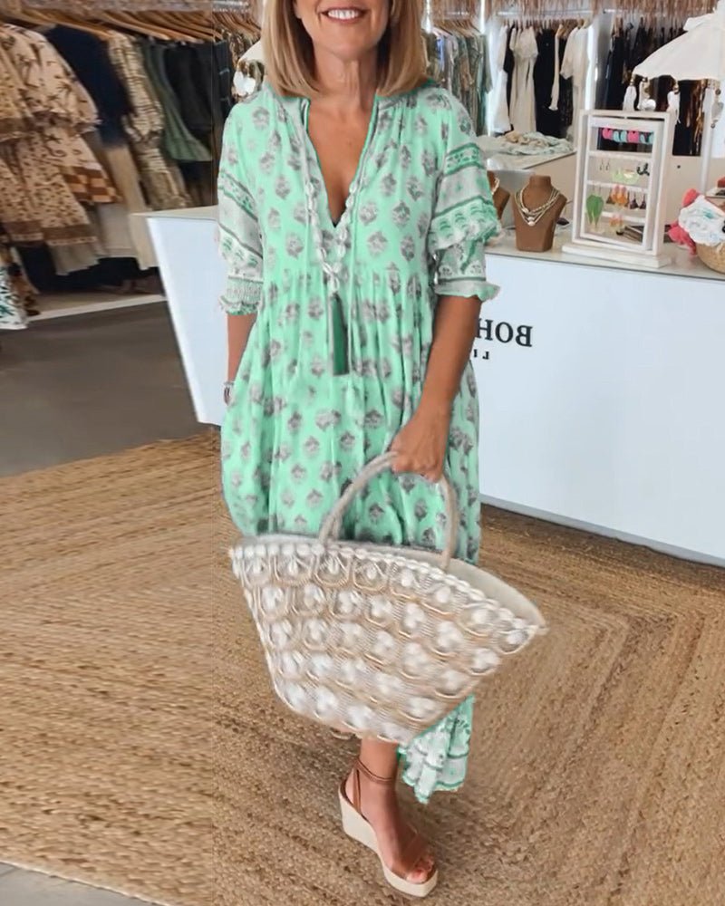 MANA | CHIQUE MIDI-JURK MET BLOEMENPRINT EN V-HALS