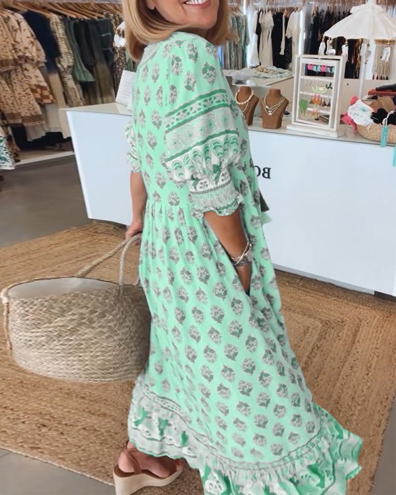 MANA | CHIQUE MIDI-JURK MET BLOEMENPRINT EN V-HALS