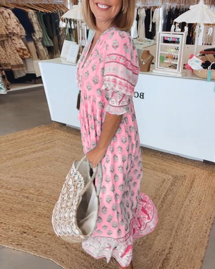 MANA | CHIQUE MIDI-JURK MET BLOEMENPRINT EN V-HALS