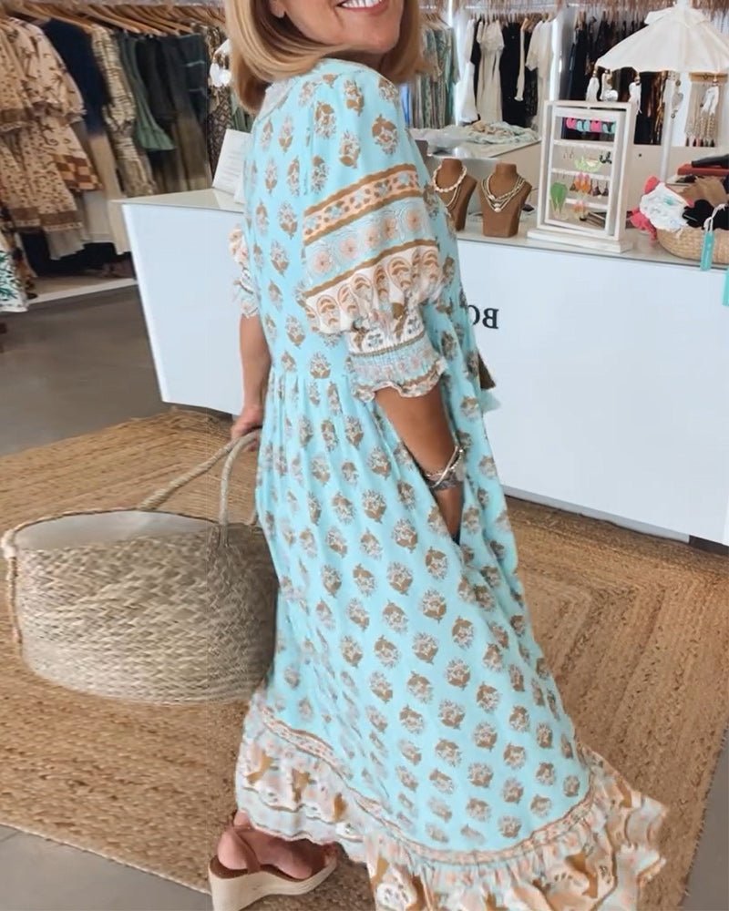 MANA | CHIQUE MIDI-JURK MET BLOEMENPRINT EN V-HALS