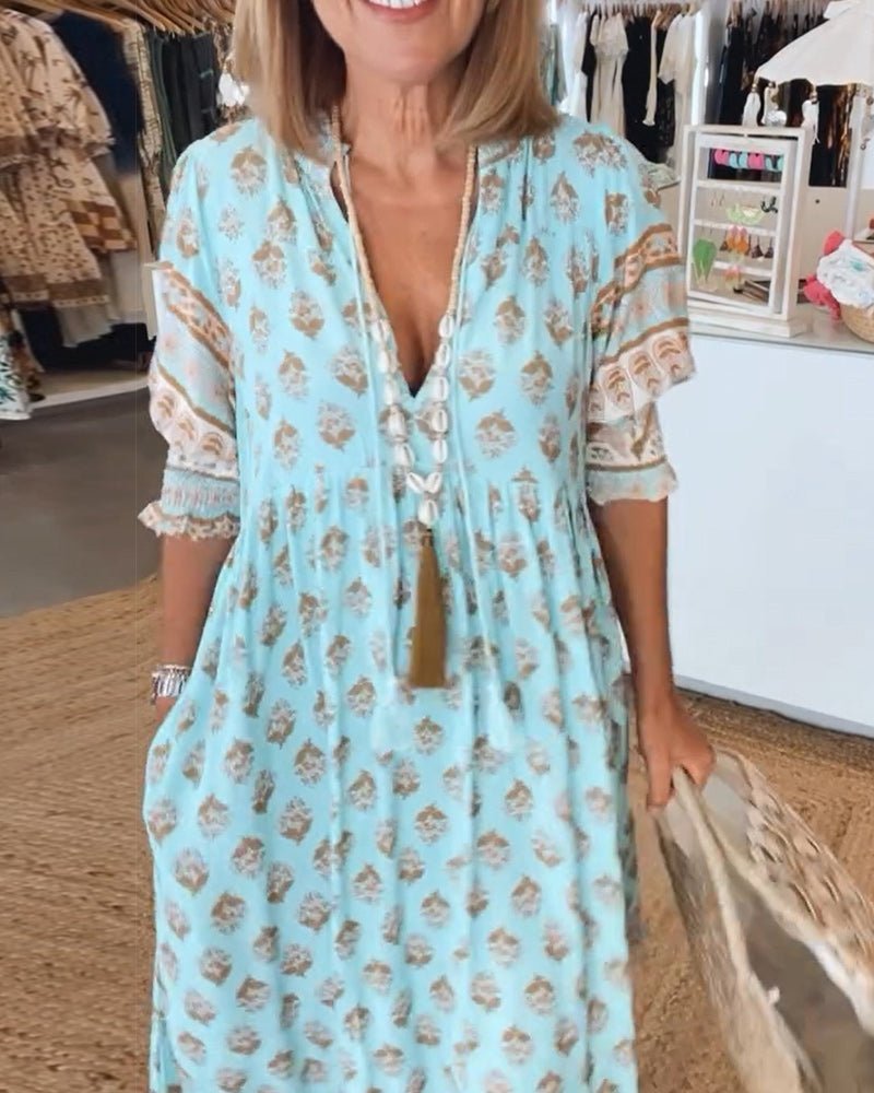 MANA | CHIQUE MIDI-JURK MET BLOEMENPRINT EN V-HALS